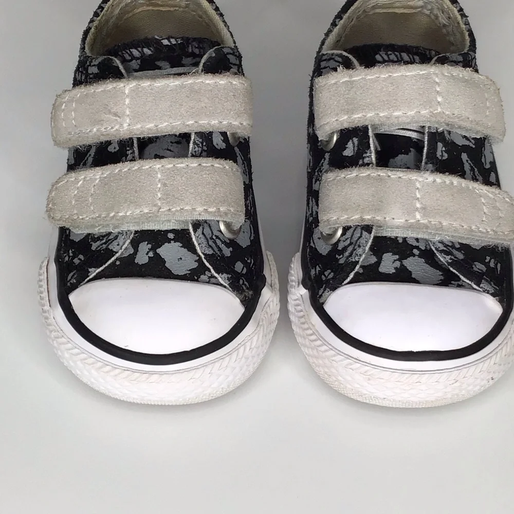 Converse Chuck Taylor All Star 2V Black and Gray Leopard Print Sneakers.